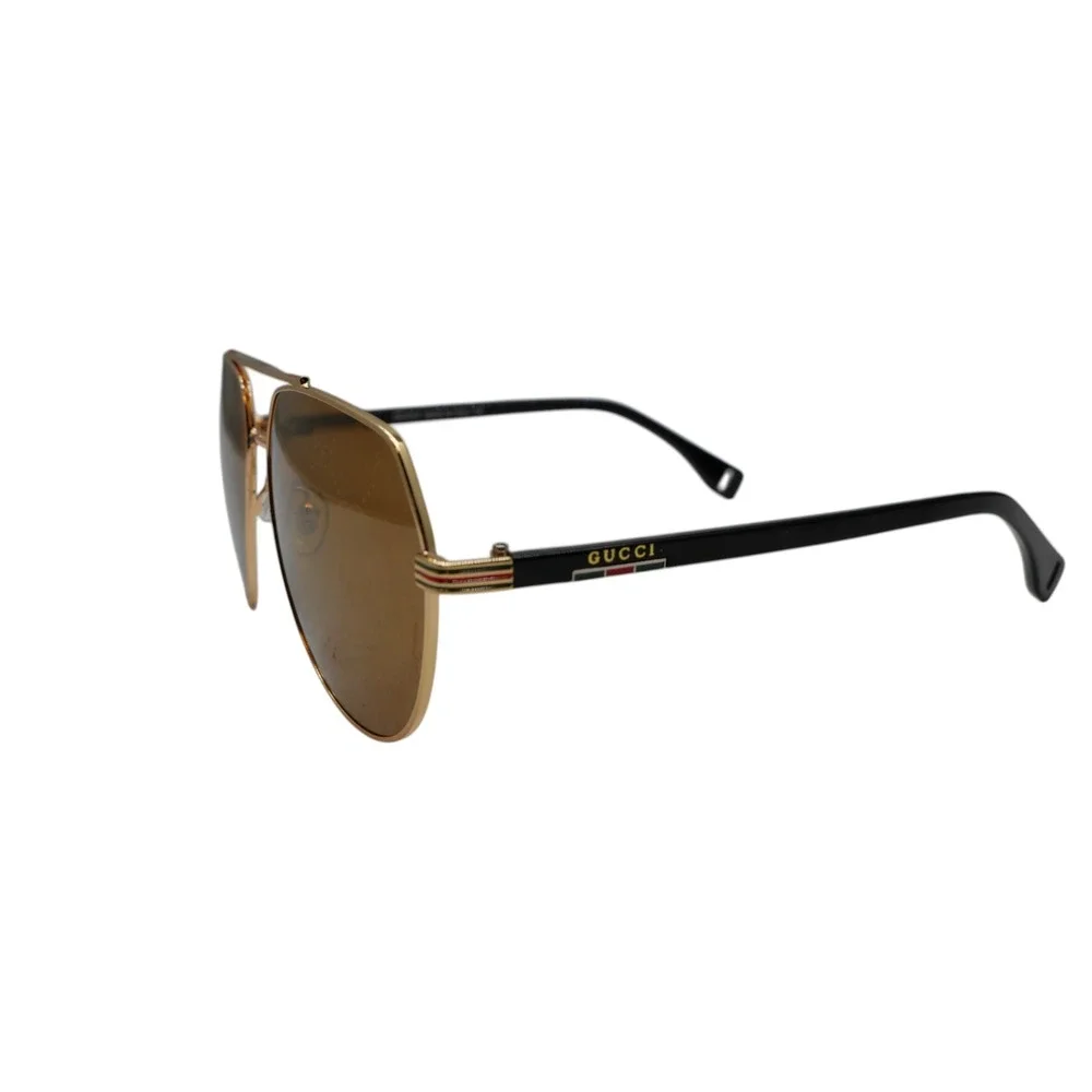 Gucci GG105 Sunglasses 59-15-132 Gold Aviator Brown GG Logo Lens Black Temple